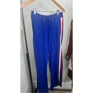 Blue Track Pants with Red and White Stripes